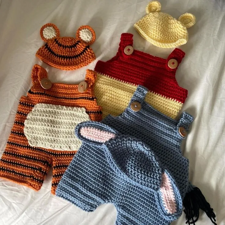 Three Animal Overall Sets in rust, gold, red and blue